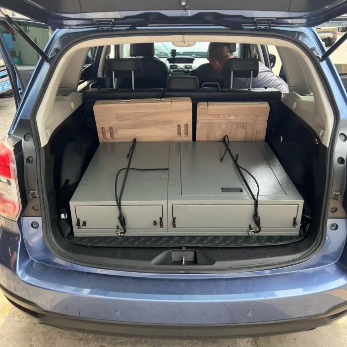 Subaru Forester with Metal Camping Box in Car