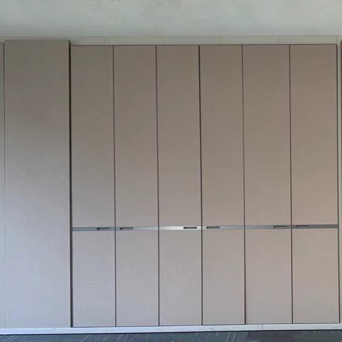 Subtle and luxurious fabric leather wardrobe doors